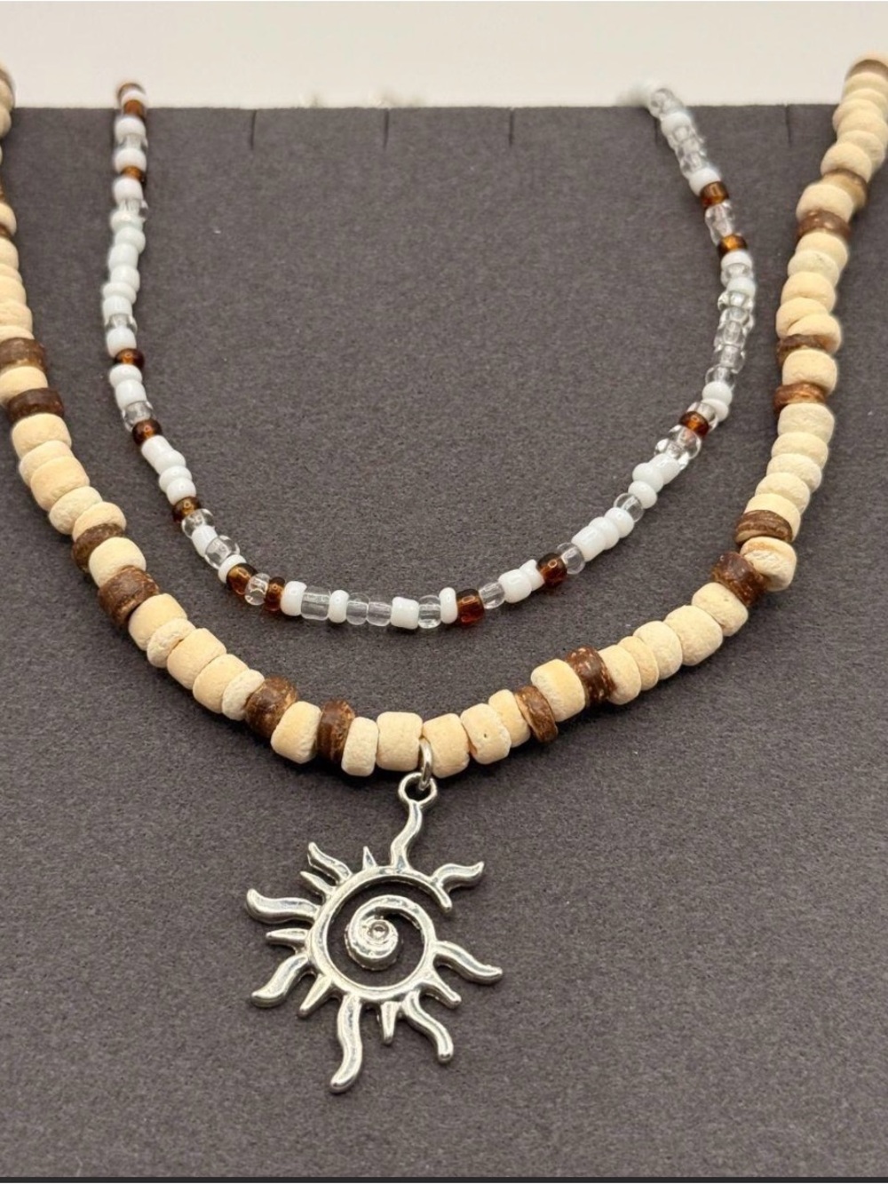 Sea Layered Beaded Necklace with Silver Sun Charm in Cream & Brown